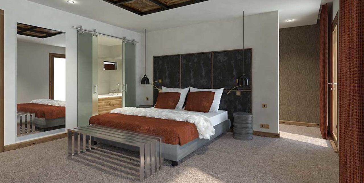 Intérieur d'une chambre à coucher avec lit double, décoration moderne et accès à une salle de bain privative
